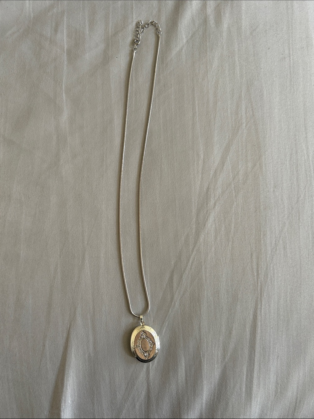 Women's Silver Oval Locket Necklace with Engraved Detail